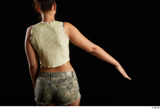 Jennifer Mendez 1 arm back view casual dressed flexing tank…